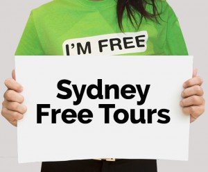 I'm Free Tours Sydney guide holding a sign. Click to find out more about Sydney tours